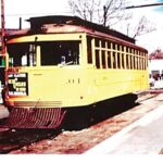 An old picture of the .04 trolley running through Olde Town Arvada.
