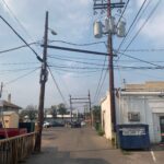 Image of overhead electric and telecommunication lines in Olde Town.